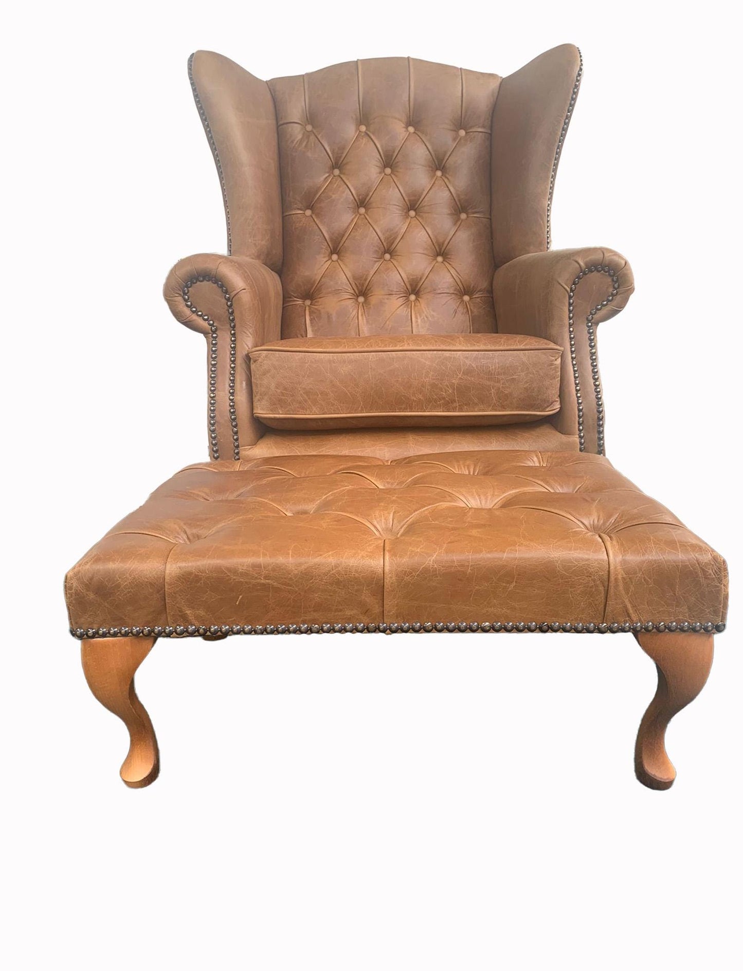 Chesterfield High Back Wing chair and Stool - Presented In Genuine Vintage Tan Leather - The Kensington