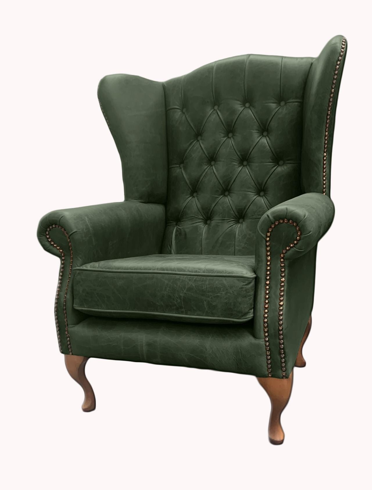 Chesterfield High Back Wing chair - Presented In Genuine Vintage Green Leather - The Kensington