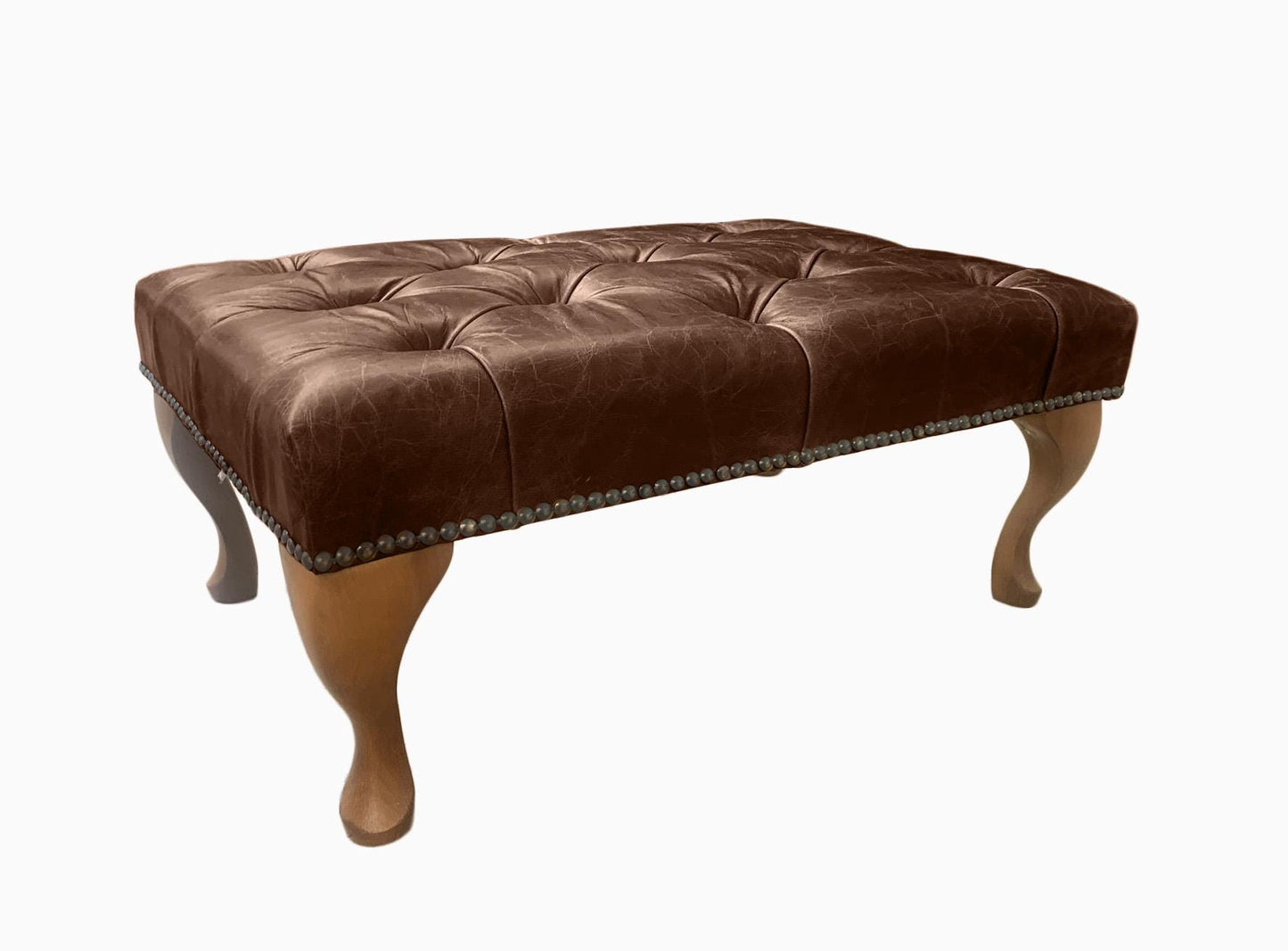 Chesterfield High Back Wing chair and Stool - Presented In Genuine Vintage Brown Leather - The Kensington