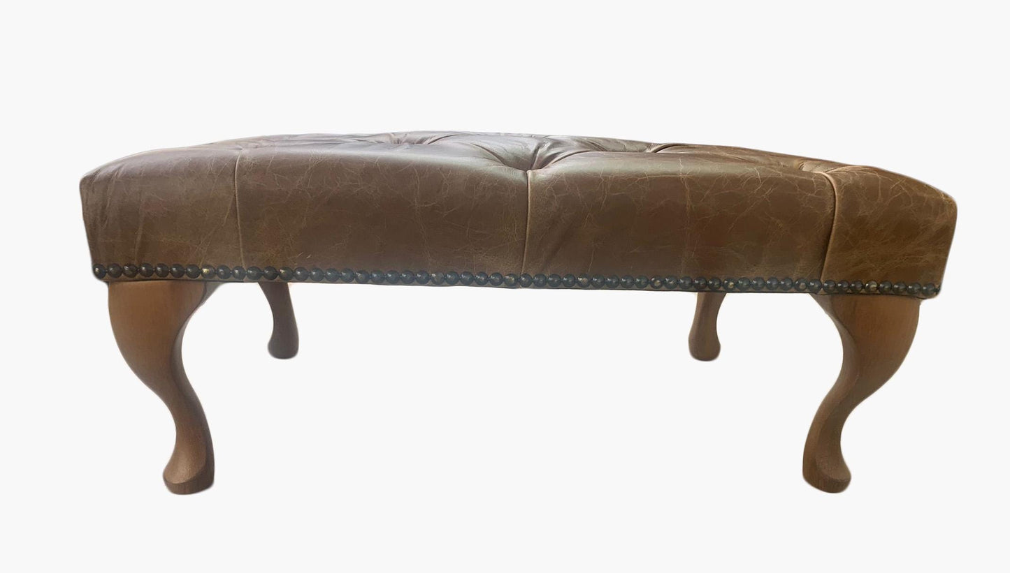 Chesterfield High Back Wing chair and Stool - Presented In Genuine Vintage Tan Leather - The Kensington