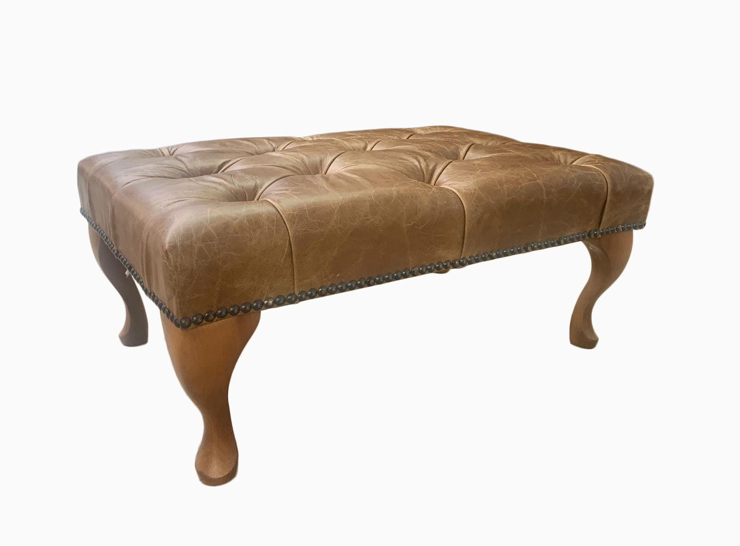 Chesterfield High Back Wing chair and Stool - Presented In Genuine Vintage Tan Leather - The Kensington