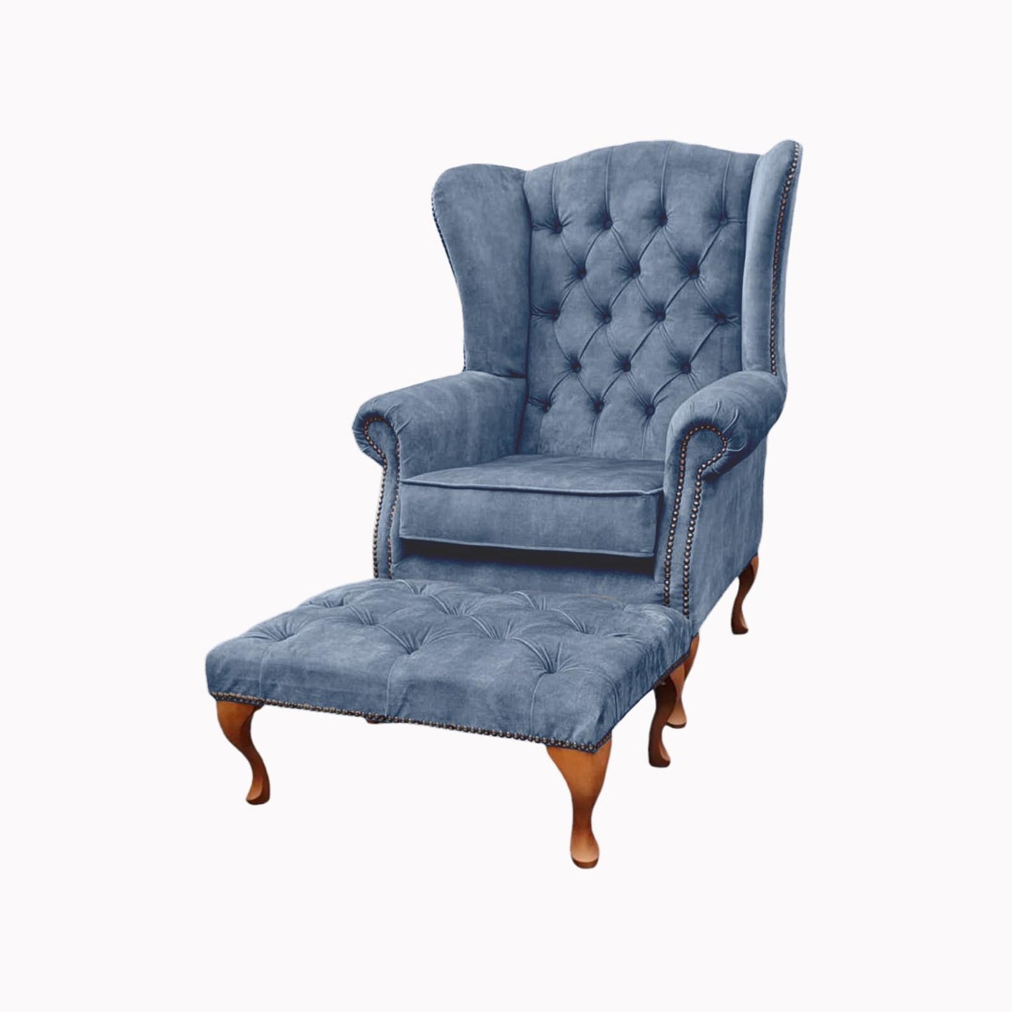 Chesterfield High Back Wing chair and stool - Presented In Luxury Blue Velvet - The Kensington
