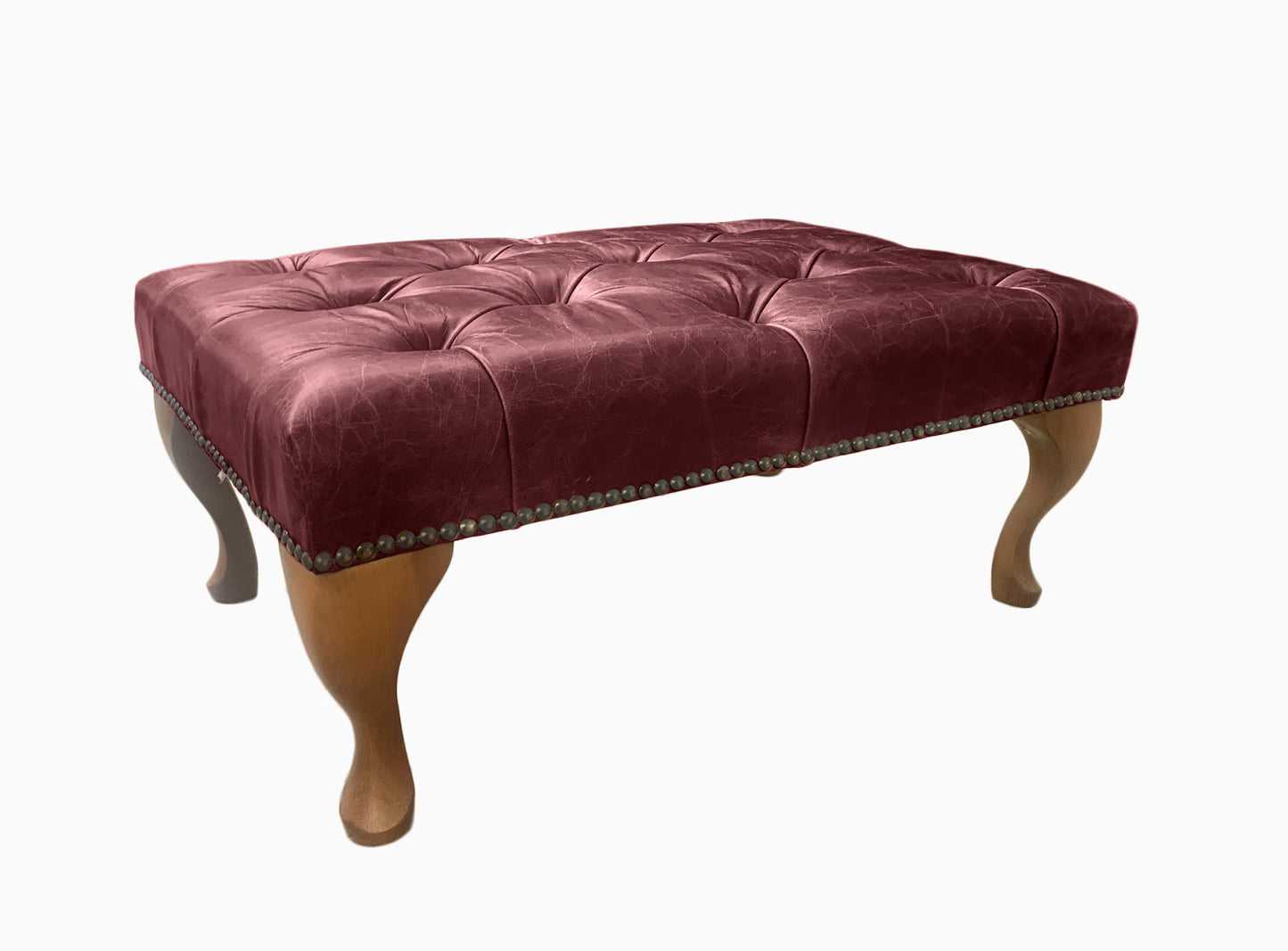 Chesterfield High Back Wing chair and Stool - Presented In Genuine Vintage Red Leather - The Kensington