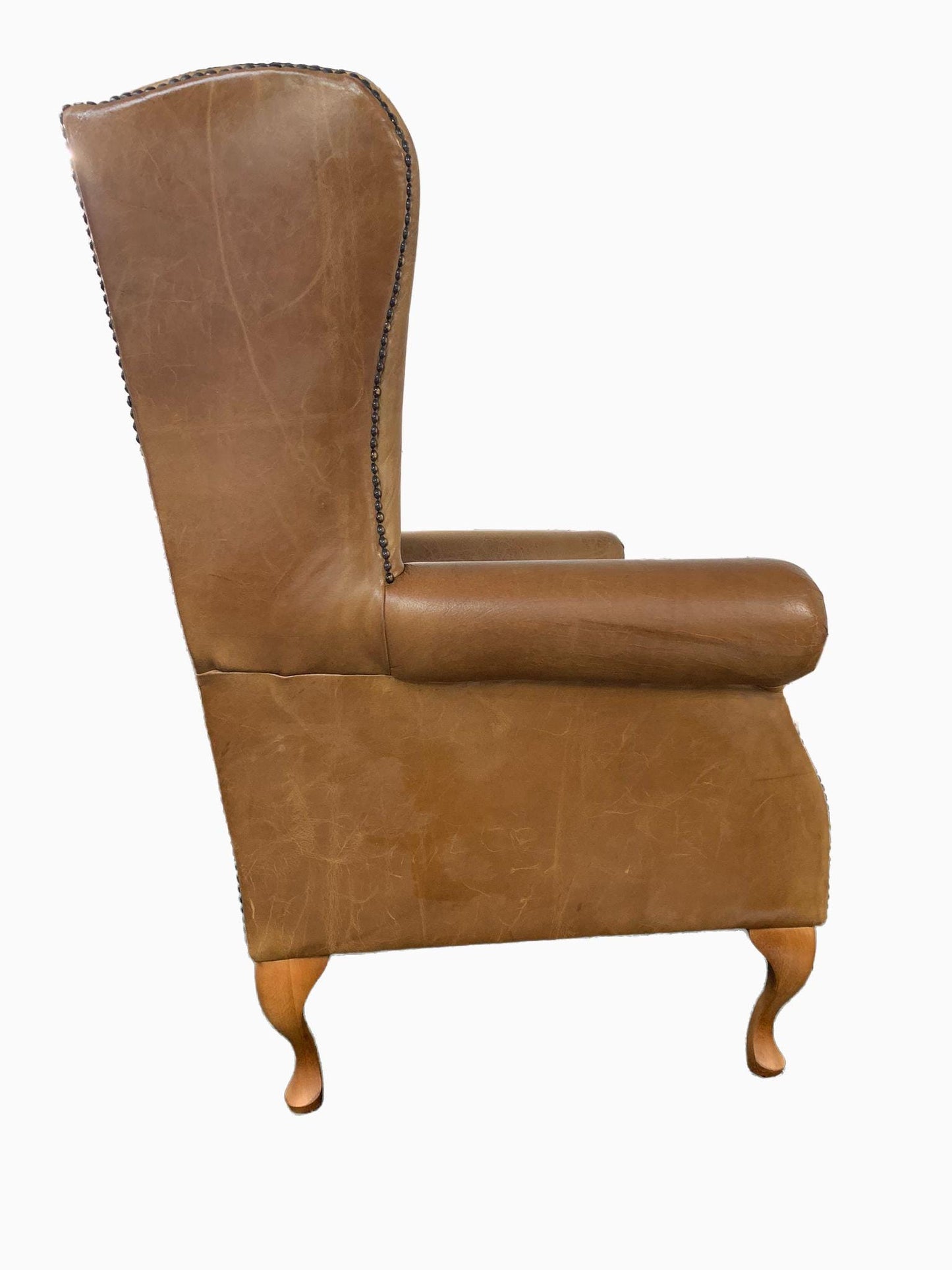 Chesterfield High Back Wing chair - Presented In Genuine Vintage Tan Leather - The Kensington