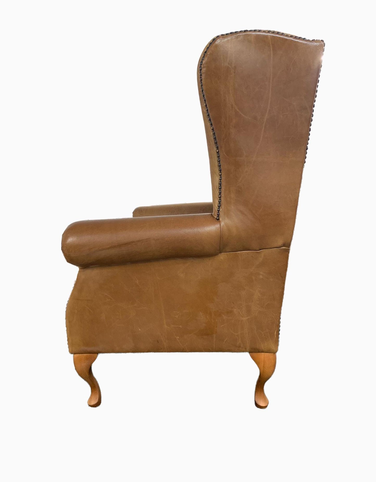 Chesterfield High Back Wing chair and Stool - Presented In Genuine Vintage Tan Leather - The Kensington