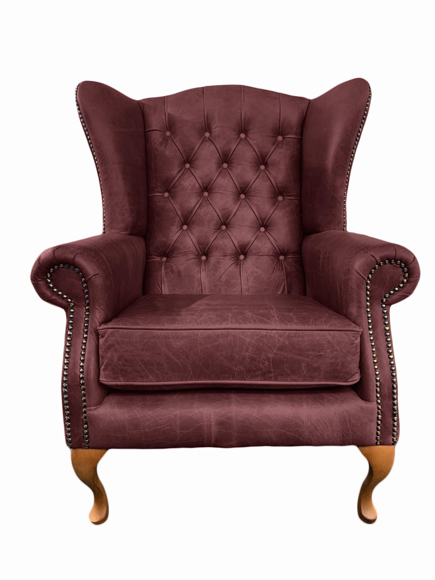 Chesterfield High Back Wing chair and Stool - Presented In Genuine Vintage Red Leather - The Kensington
