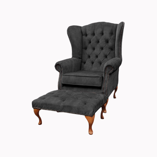 Chesterfield High Back Wing chair and stool - Presented In Luxury Charcoal Velvet - The Kensington