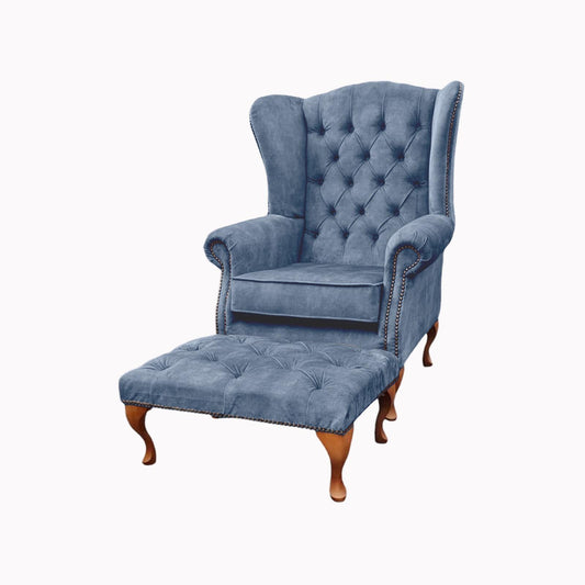 Chesterfield High Back Wing chair and stool - Presented In Luxury Blue Velvet - The Kensington