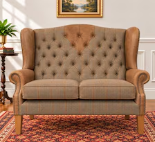 Harris Tweed and leather wingback two seater sofa, front view