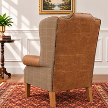 Harris Tweed and leather wingback chair, front view